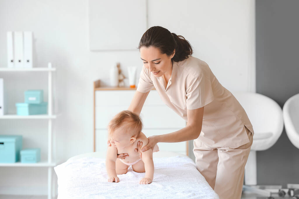 therapist working cute baby medical center