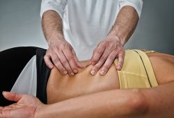Osteopath,Working,With,Patient